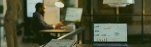 Office manager reviewing helpdesk response time with an IT support technician in Atlanta